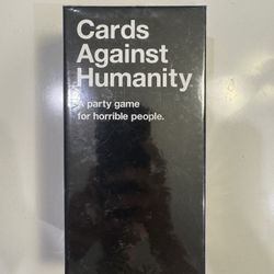 Cards Against Humanity with ext packs (new in wraps)
