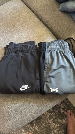 Pair of Nike and Under armor  sweats