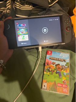 Nintendo Switch 2 in box with carrying case