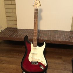 Fender Starcaster Electric Guitar + Gigbag & Amp + E