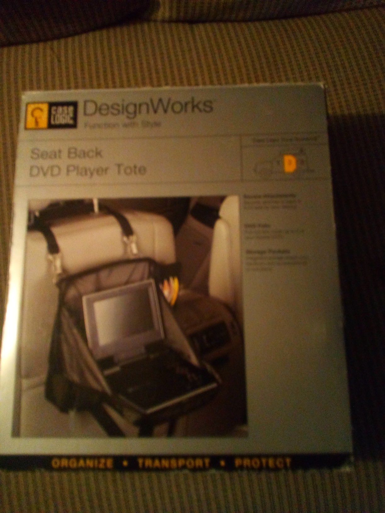 Designworks seat-back DVD player tote