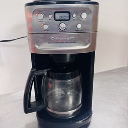 Coffee maker with grinder