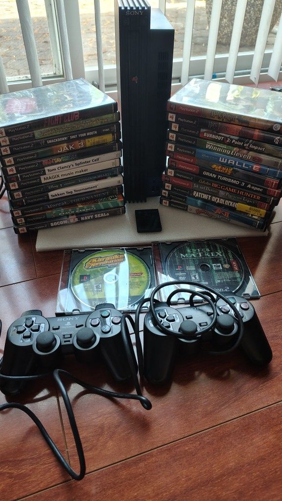 PlayStation 2 With 28 Games And Two Controllers Works Perfectly