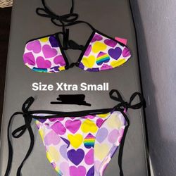 Brand New 2 Piece Bathing Suit Size Xtra Small (KIDS)