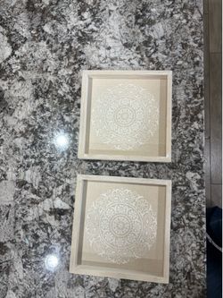 Set of 2 mandala style canvas wall hangings