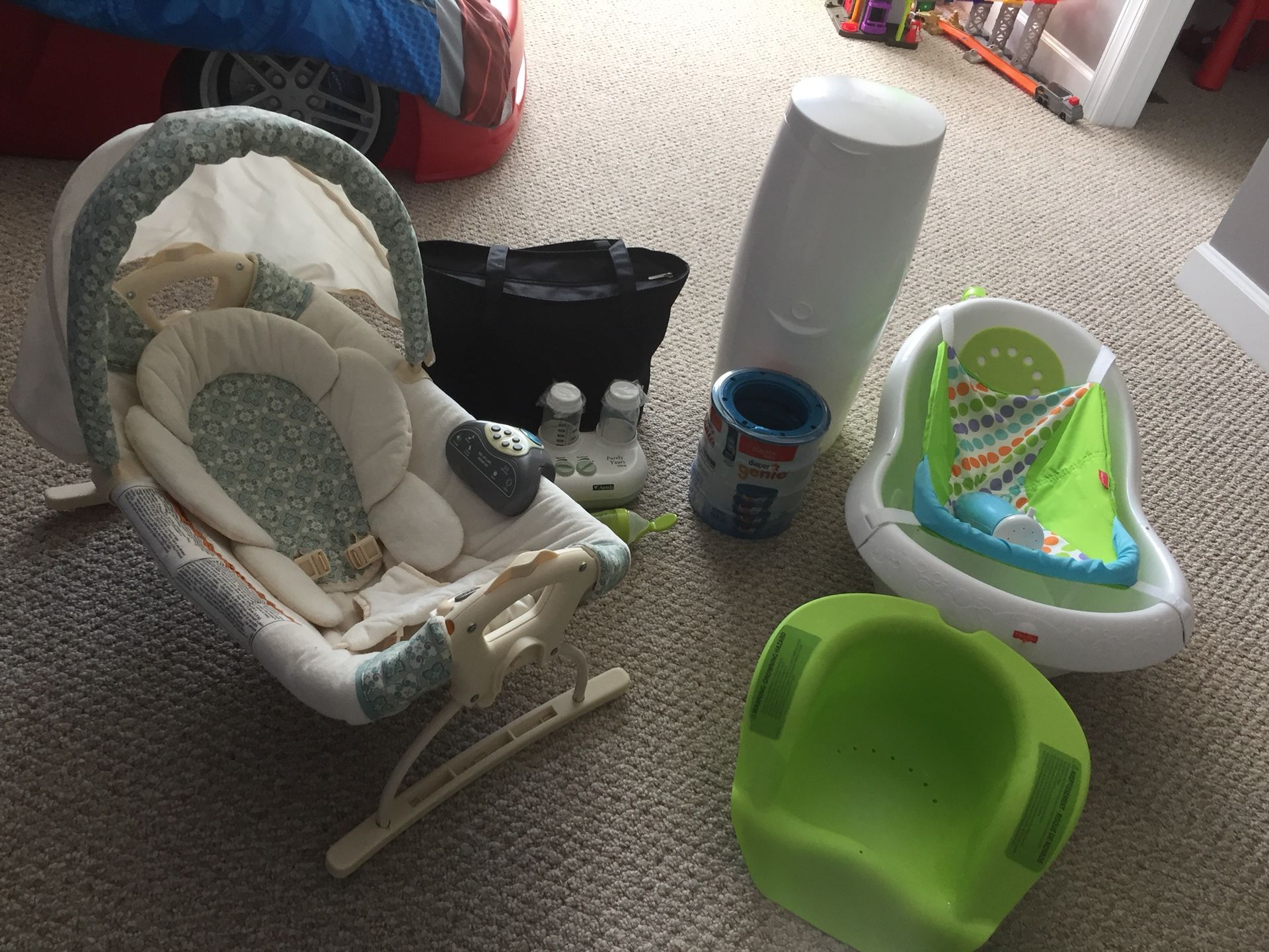 Baby essentials (bath, vibrating infant bassinet with sounds, diaper pail with set of bags, breast pump with bottles) save over $400 on this $90 set