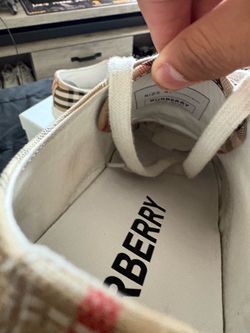 MENS BURBERRY LOW TOP SNEAKERS.    Worn only about 4 times. Overall in great condition. Light wear on the bottoms and minor marks around the back Burb