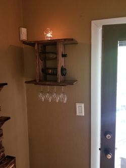 Handmade floating wine rack