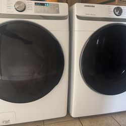 Washer and gas dryer