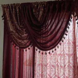 Curtains for sale 8 pieces 4 plain and 4 wooded and 4 upper pieces means 12 complete pieces 250 dollars