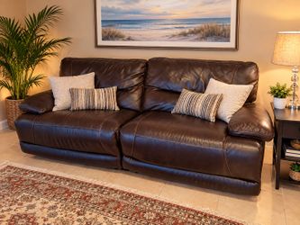 Eldorado Furniture • Leather Reclining Electric Sofa