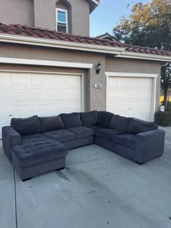 Sectional Couch with Pullout + Storage