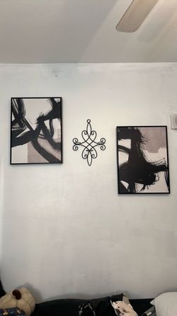 Two black and grey portraits