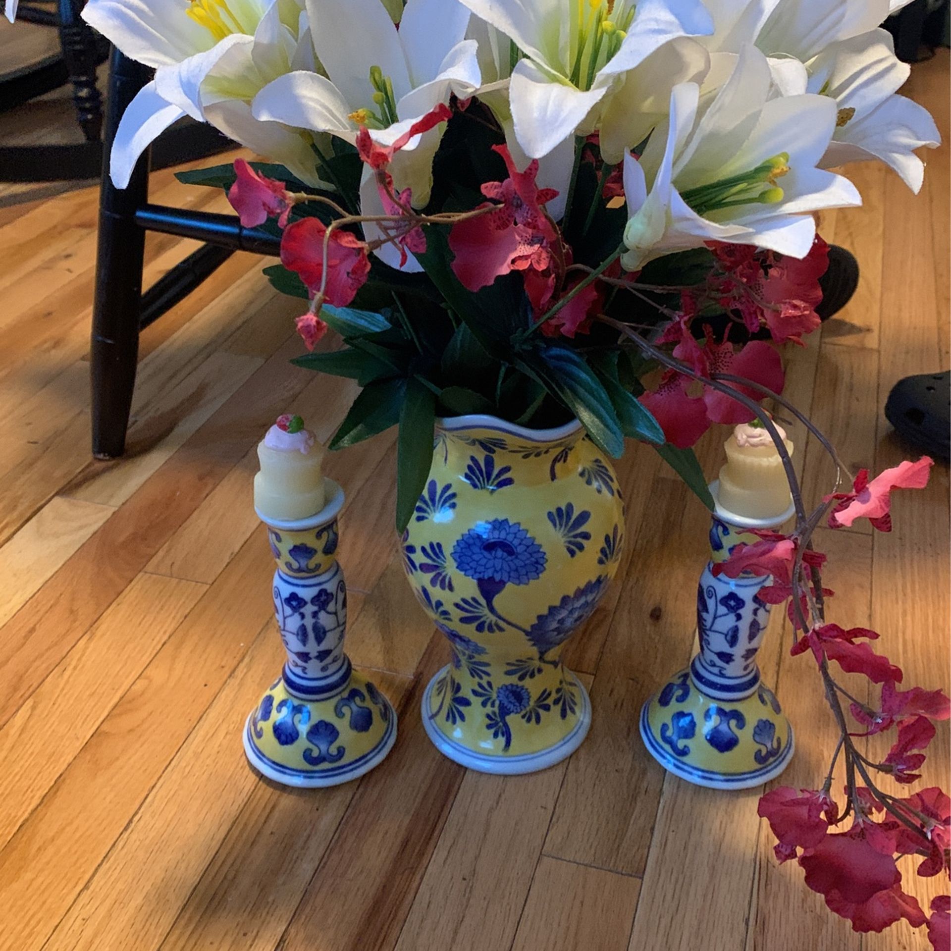 Vase with fake flowers and pair candleholders