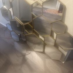 World market, brass hexagon mirror