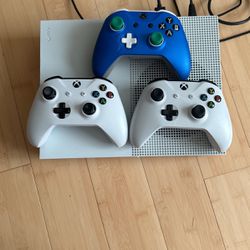 Xbox One 500 GB with A Custom Controller and Two Normal Controllers as well as Need For Speed Hot Pursuit. NEGOTIABLE PRICE
