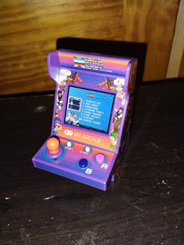 My Arcade By Data East. Like 12 Plus Games In The Battery Operated Console $10 Obo Used Like 2 Times Max.