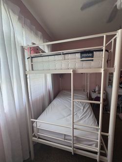 White metal bunk beds