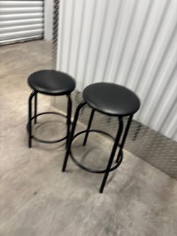 Two metal stools, 20 inch high and 24 inch high $30 for both