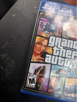 PS4  slim with 2 remotes  (gta 5) included