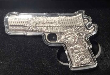 2024 Chad 2 oz Antiqued High Relief Silver .45 shaped collectable