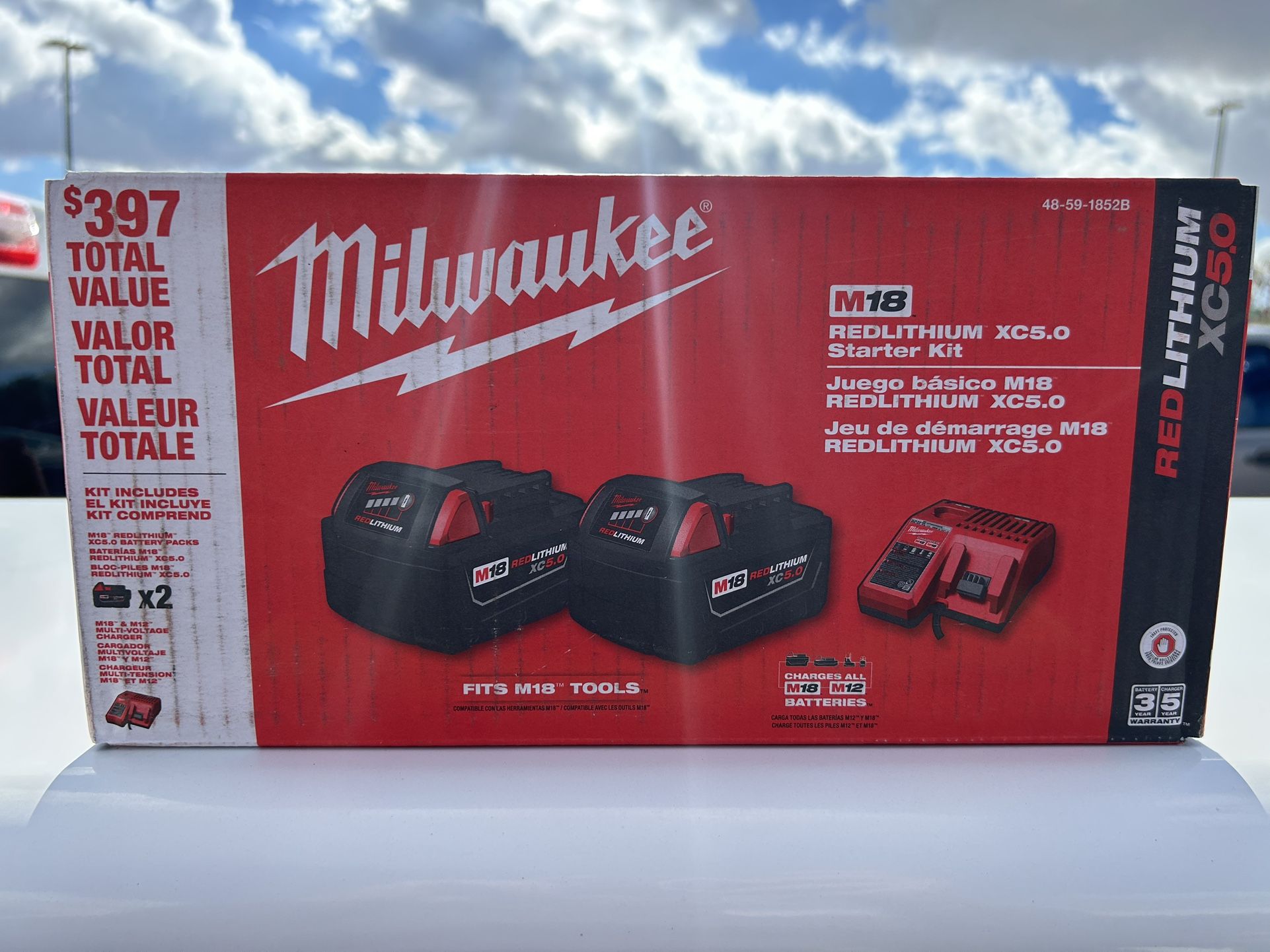 Milwaukee M18 XC 5.0 Batteries And Charger