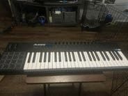 Alesis VI49 MIDI Keyboard 49 Keys And 16 Drum Pads.