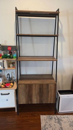 Like new ladder bookshelf with storage