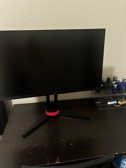 Monitor with headphones and speakers