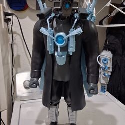 titan Cameraman action figure, from the Skibidi Toilet series. 24 inches tall. Good condition.  Collectible toy.