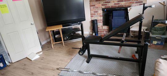 Weight bench and curl bar