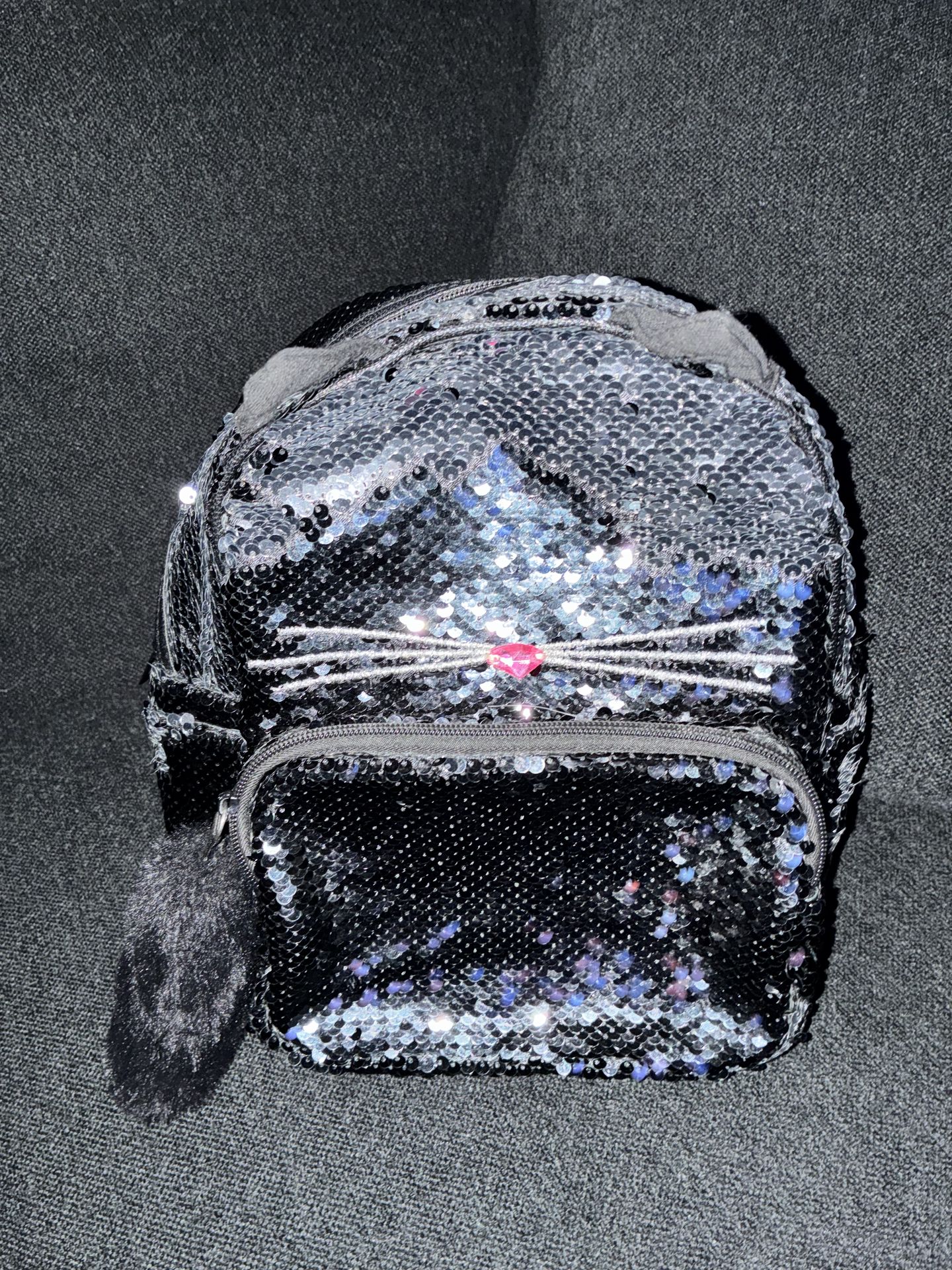 Claire’s sequin cat mini backpack
