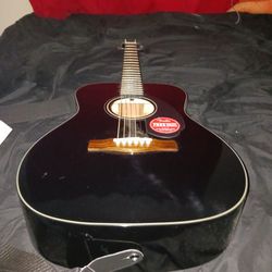 Black Fender Acoustic guitar