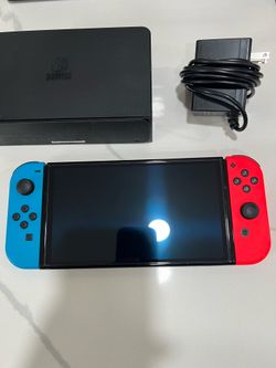 OLED Nintendo Switch Console with Blue and Red Controllers, Dock and Accessories