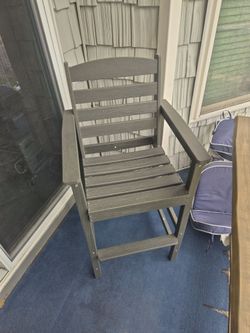 Poly bar height outdoor chairs with a connecting table