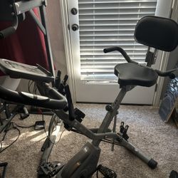 Stationary Bike With Arm Strengthening And Leg Resistance 