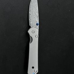 Titanium Folding Knife – Damascus Blade – Sebenza 31