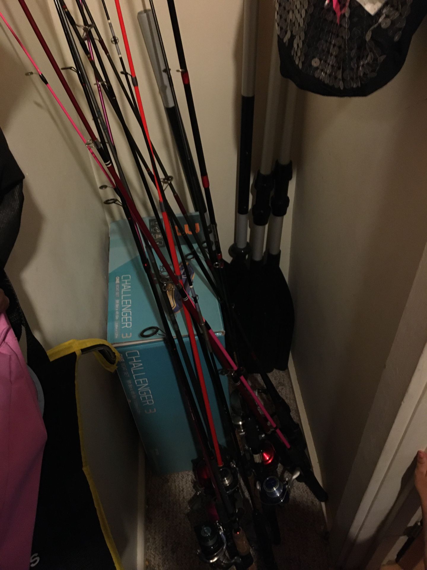 fishing poles and an inflatable boat