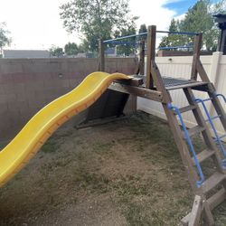 Slide With Rock Climbing Wall