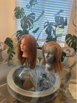 Two practicing manikin heads