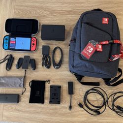 Nintendo Switch OLED + 16 Games And Travel Accessories Bundle