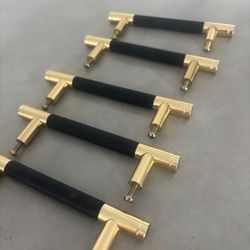 5 drawers handles  with leather grip in the middle .. 4” bet screws.. $40 for all