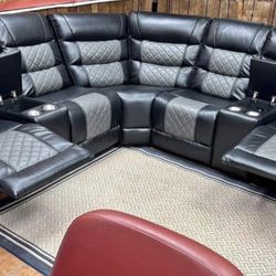 Black Reclining Sectional With 2 Recliners. Brand New.