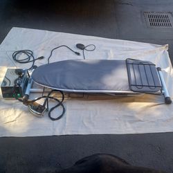 Professional air ironing board with Italian boiler iron setup