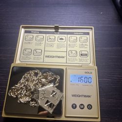 10k Gold Chain And Trap House Pendant 