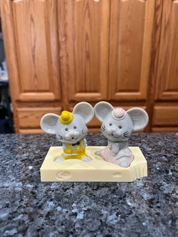 Vintage Plastic Mice On Cheese Base Pair of Salt and Pepper Shakers. Preowned never used. Has been on display in a cabinet with a very large salt an