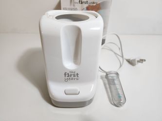 The First Years 2-in-1 Simple Serve Bottle Warmer, Quickly Warm Bottles