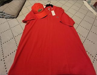 XL red Lacoste Polo shirt. Red Lacoste cap one size.