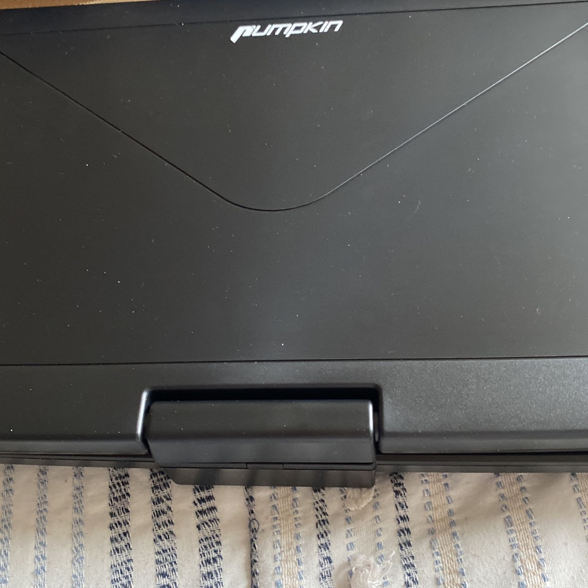 A Brand New Portable Blu- Ray Disc / DVD Player