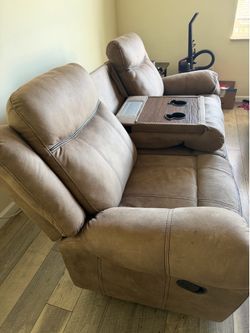 Brown suede reclining sofa